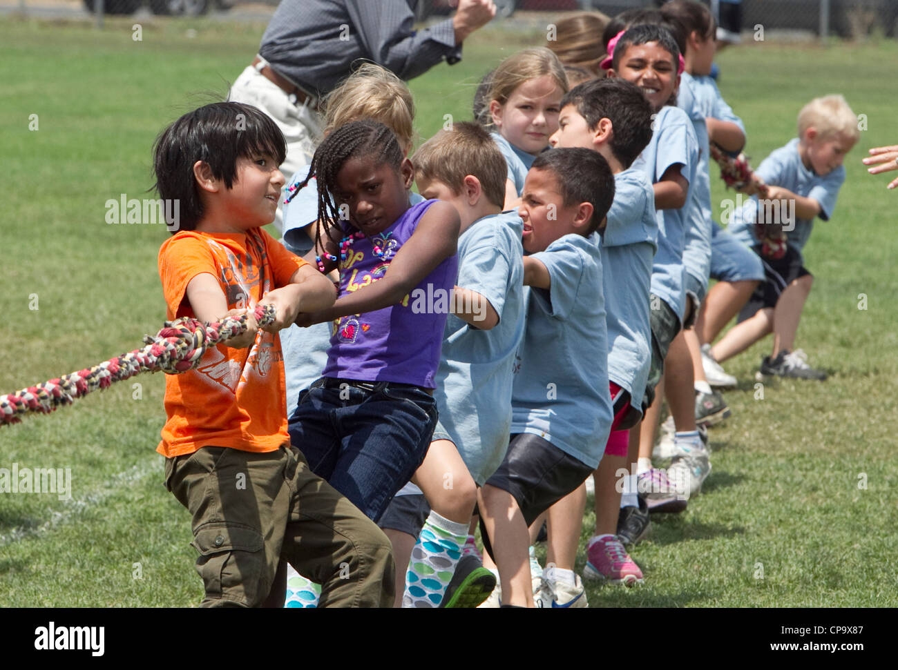 Second Grade Elementary School Age Kids Participate In Tug of war During Track And Field Day At School Stock Photo Alamy