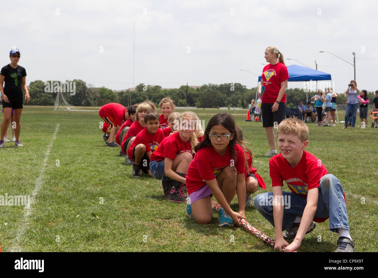 Second Grade Elementary School Age Kids Participate In Tug of war During Track And Field Day At School Stock Photo Alamy